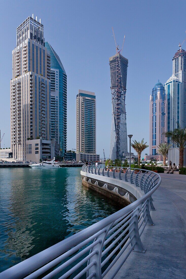The Dubai Marina with high rise buildings and boats in Dubai, UAE, Persian Gulf