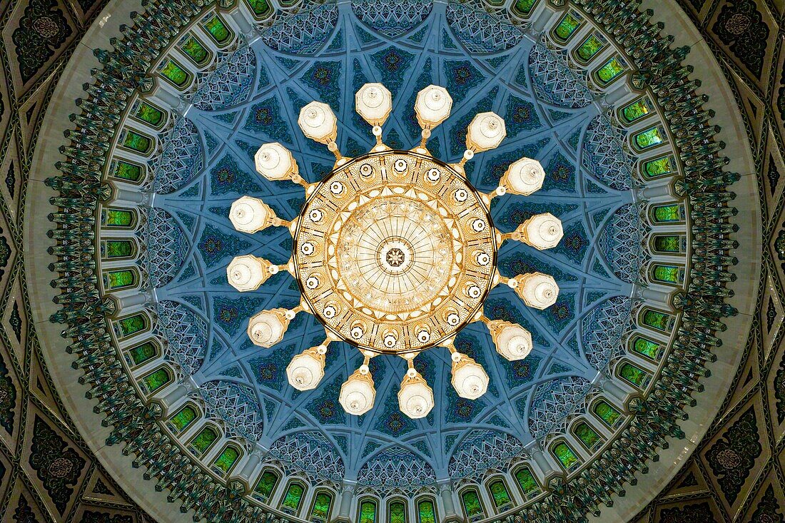 Decorative chandelier with ceiling detail in the prayer room of the Grand Mosque in Muscat, Oman