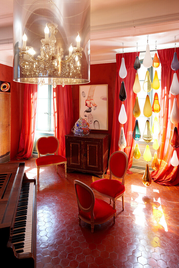 Music room with piano from author Andre Gide from 1900, B and B Chambre Avec Vue, Luberon, France