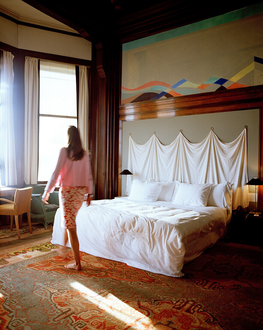 Woman inside a hotel room, Rotterdam, Netherlands