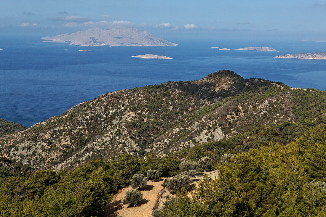 Landscape on the west coast of Rhodes and a view onto the island of Chalki, Rhodes, Dodecanese Islands, Greece, Europe