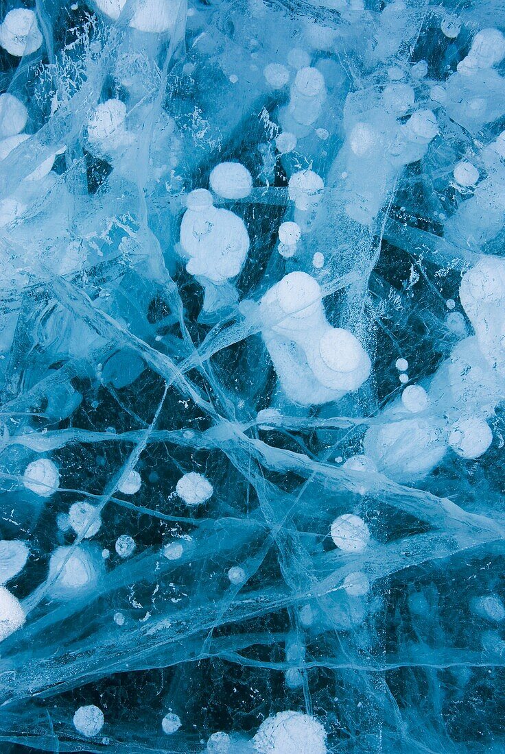 Abstract patterns in the wind polished ice of Abraham Lake, Alberta Canada