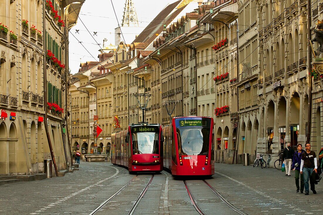 Trams on Marktgasse in the medieval city center of Bern, Canton Bern, SwitzerlandBern, Canton Bern, Switzerland