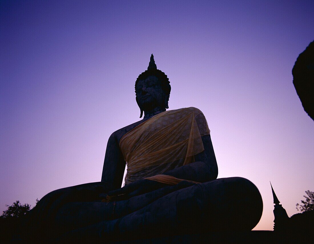 Dawn, Seated Buddha, Silouhette, Sukhothai, Thailan. Asia, Buddha, Dawn, Heritage, Holiday, Landmark, Seated, Silouhette, Sukhothai, Thailand, Tourism, Travel, Unesco, Vacation, Wat