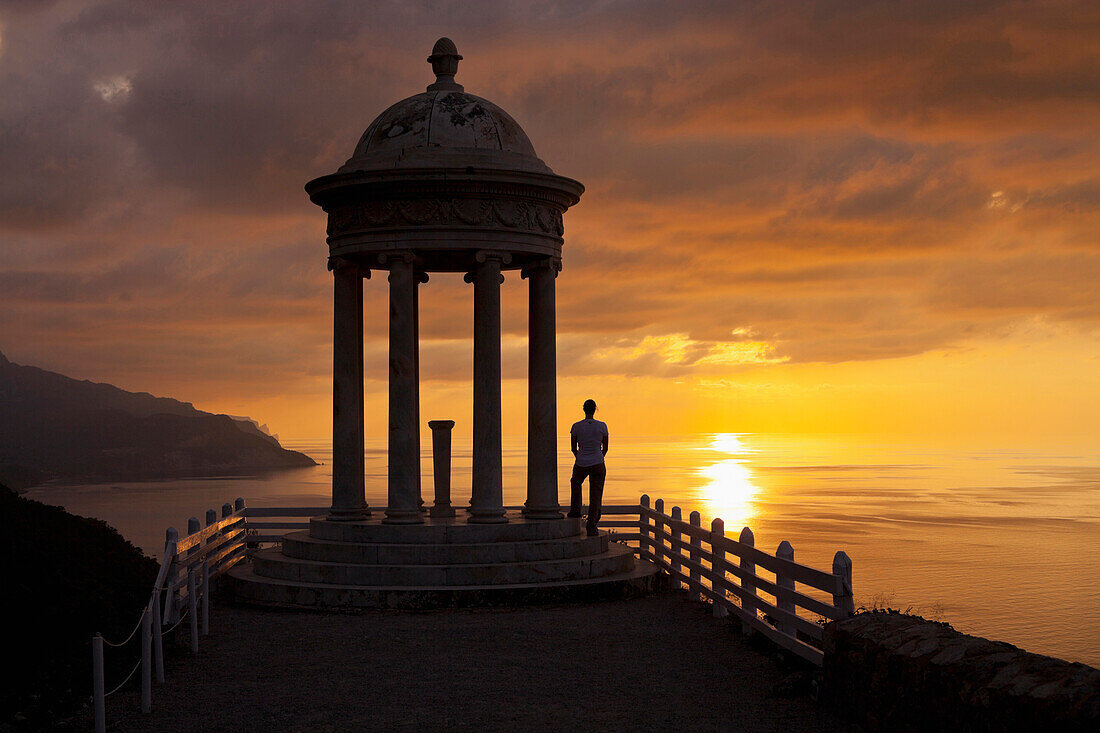 Young woman at Son Marroig at sunset, Cordillera Norte, Mallorca, Spain