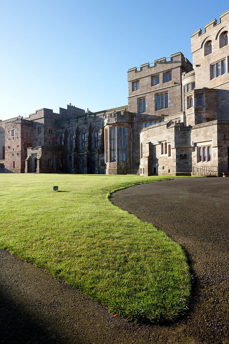 Lawn in front of Bamburgh Castle, Bamburgh, Northumberland, England, Great Britain, Europe