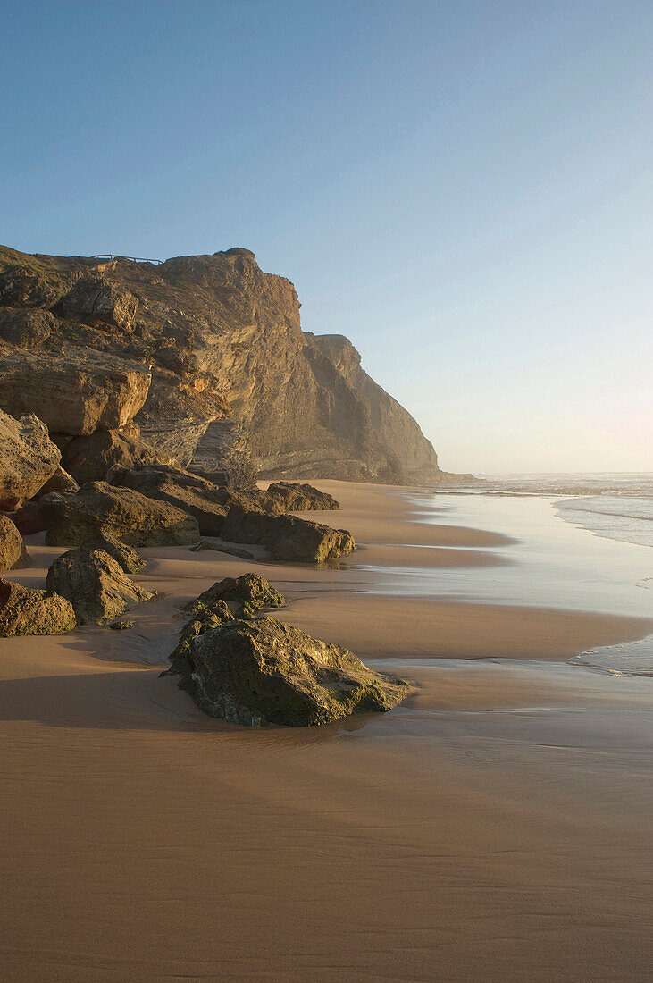 Cliffs on the beach soft evening light, Monte Clerigo, west coast of Algarve, Costa Vicentina, Algarve, Portugal, Europe