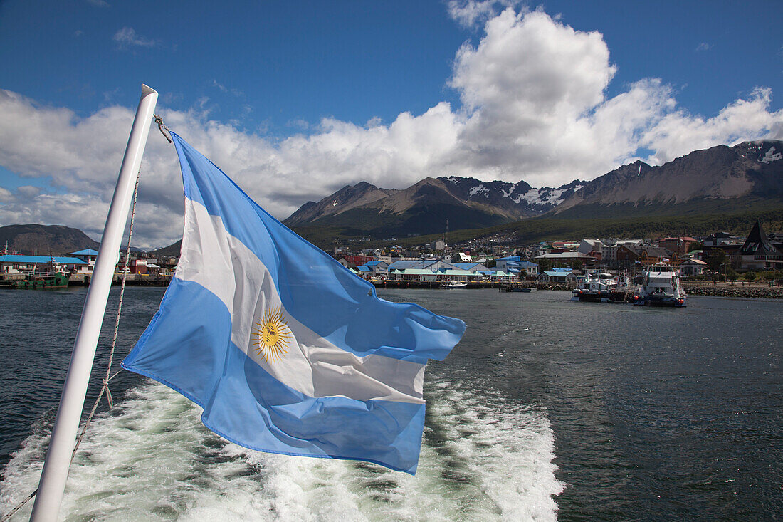 Argentine national flag on back of boat in Beagle Channel, Ushuaia, Tierra del Fuego, Patagonia, Argentina, South America