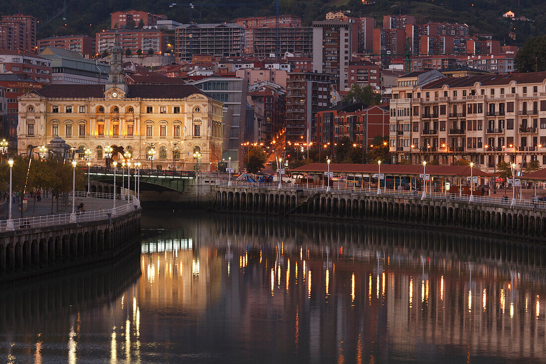 Town hall at the river Rio Nervion in the evening, Bilbao, Province of Biskaia, Basque Country, Euskadi, Northern Spain, Spain, Europe
