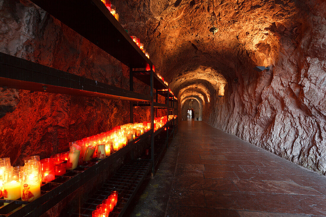 Candles in the holy cave Santa Cueva de Covadonga, Covadonga, Picos de Europa, Province of Asturias, Principality of Asturias, Northern Spain, Spain, Europe
