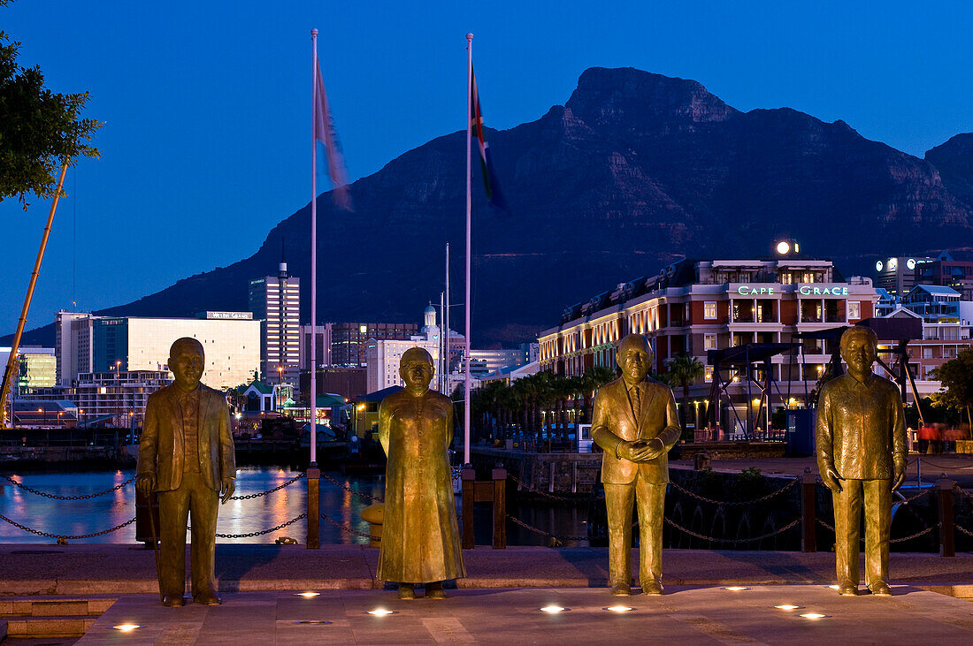 South Africa, Western Cape Province, Cape Town, Victoria & Alfred Waterfront pier, Nobel Square, statues of the nobel prizes Albert Luthuli (1960), Desmond Tutu (1984), Frederik Willem de Klerk (1993) and Nelson Mandela (1993)