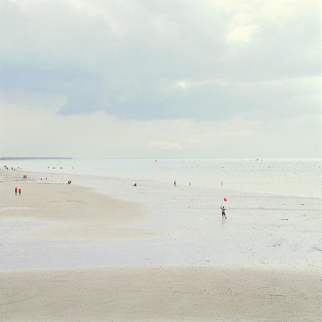 Beach. people on bognor beach at low tide