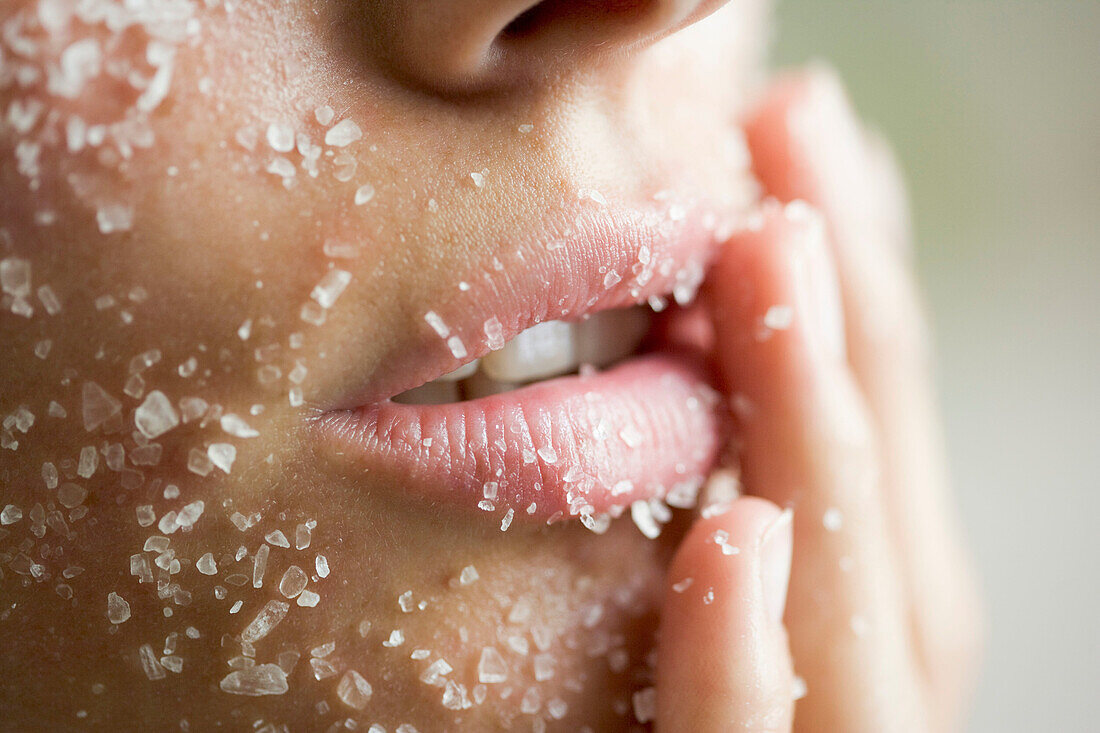 young woman with salt_peeling_mask