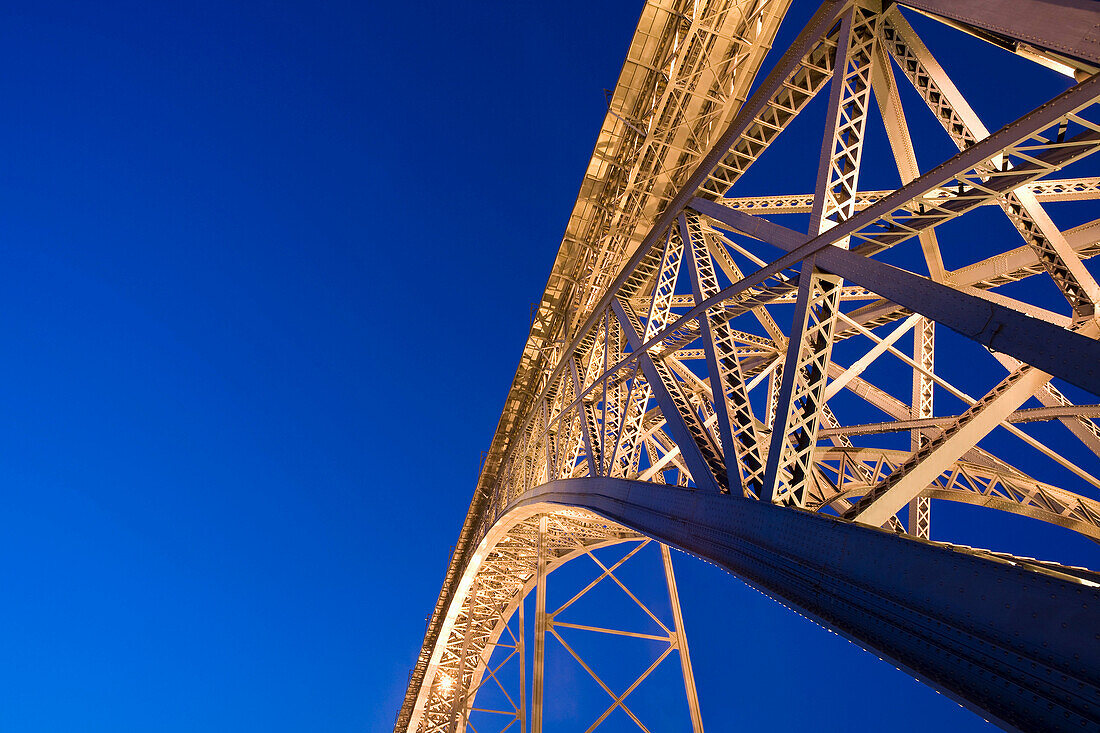 Ponte Dom Luis. The bridge Ponte Dom Luis is a metal arch bridge that spans the river Douro and connects Porto with Gaia