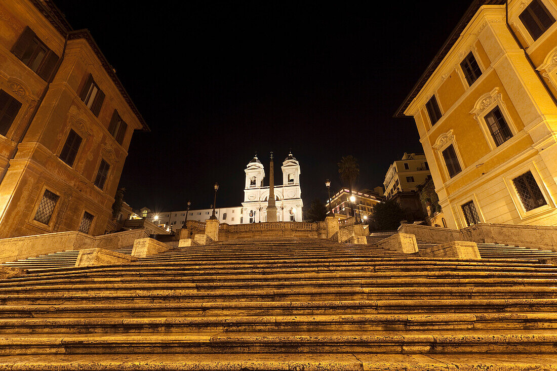 Spanish Steps lit up at night. The Spanish Steps Italian: Scalinata della Trinità dei Monti up to the Church of Trinità dei Monti