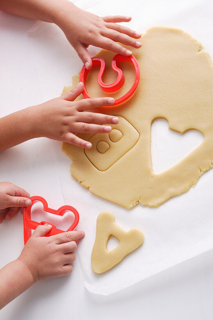 Children making cookies in letter shapes. ABCKidsCooking