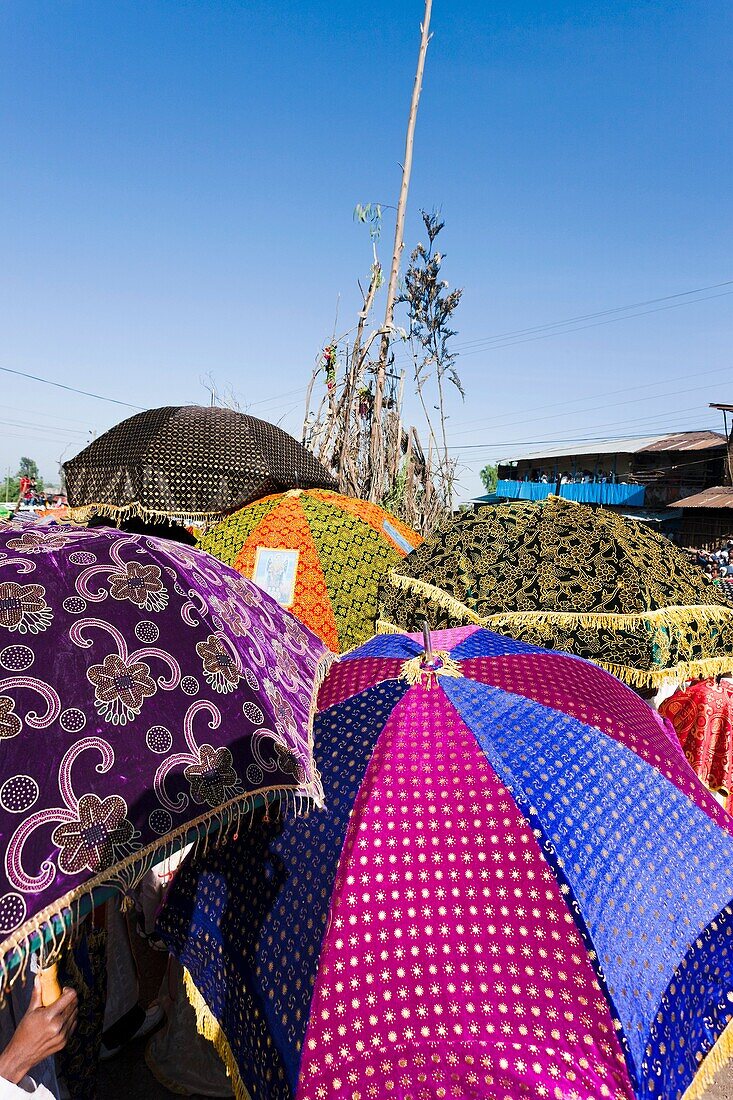 Meskel Cerimony in Lalibela Meskal, Meskal, Maskal, Mescel, Mesquel, which is taking place every September  For Meskel many pilgrims are coming to lalibela, to celebrate it at one of the holy palces in Ethiopia  Traditional colorful sunshades of the clerg