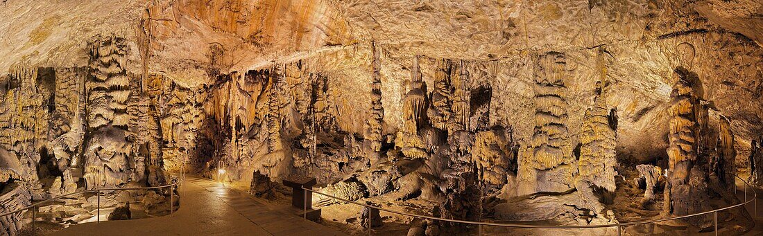 The Baradla Show Cave in the Aggtelek National Park, Hungary  During the first years as a show cave, visitors used torches for light source  The grime from the torches resulted in a black colored surface, which is now covered by a small layer of sinter  T