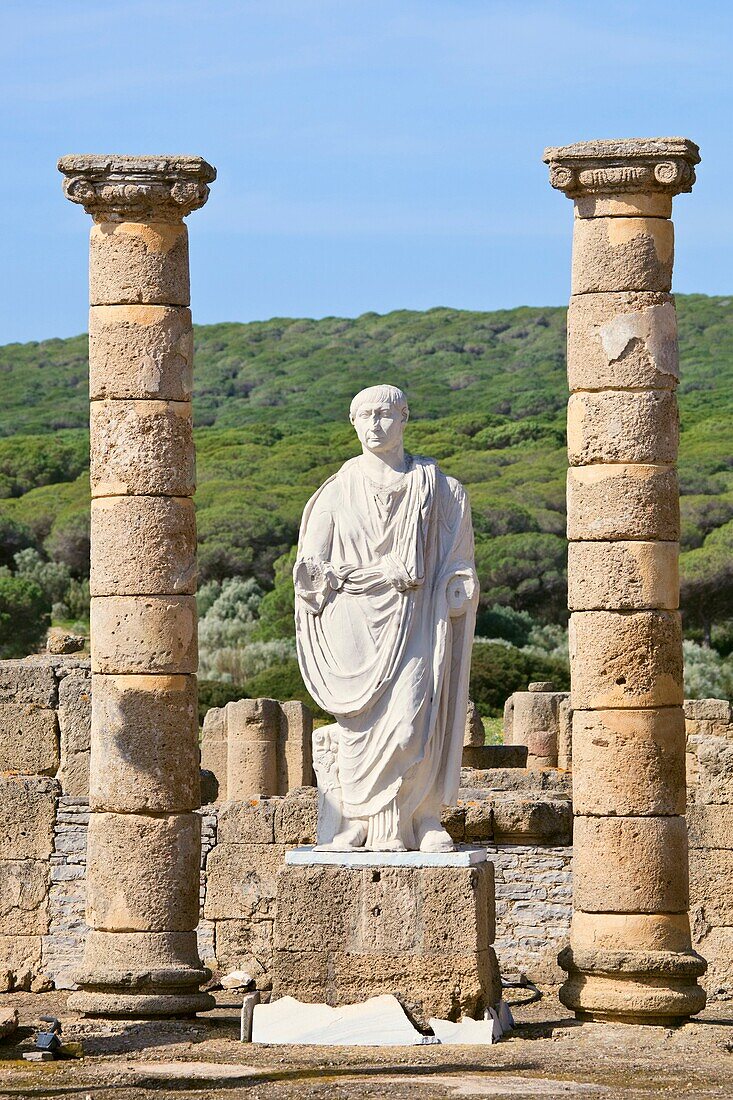 Roman ruins of Baelo Claudia, at Bolonia, Cadiz Province, Spain  Statue of the Emperor Trajan in the Forum