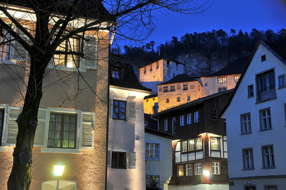 Illuminated castle and old town in the evening, Feldkirch, Vorarlberg, Austria, Europe