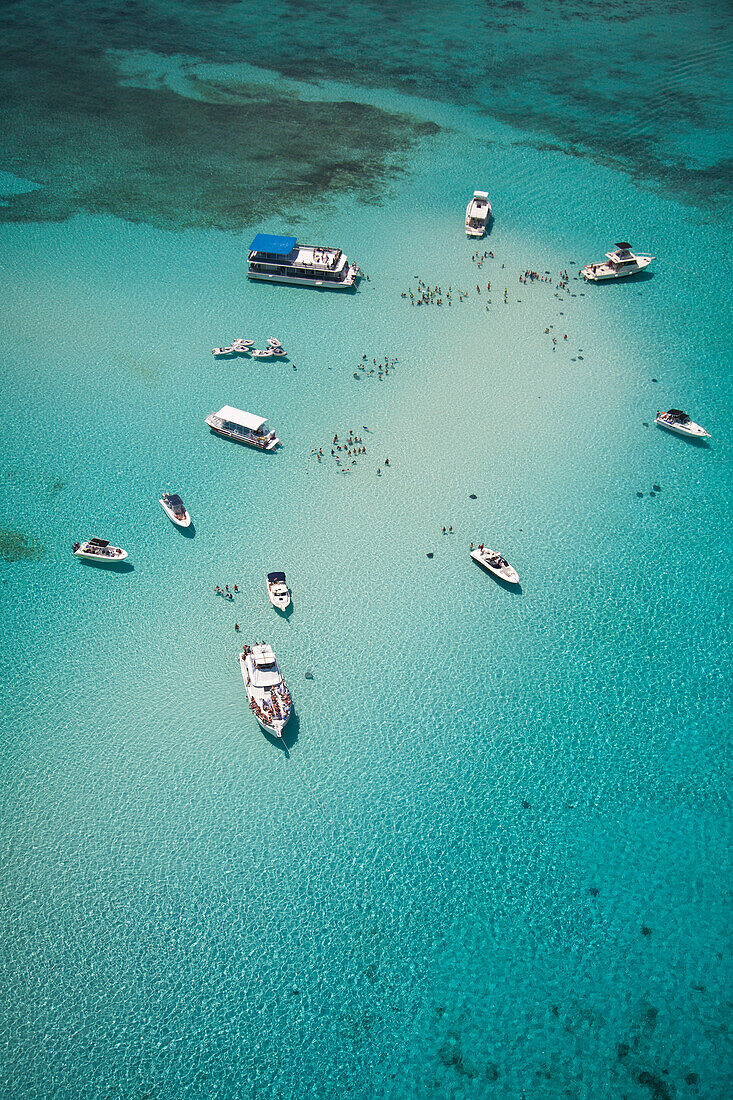 Aerial view of Stingray City sand bank with excursion boats and people swimming, Grand Cayman, Cayman Islands, Caribbean