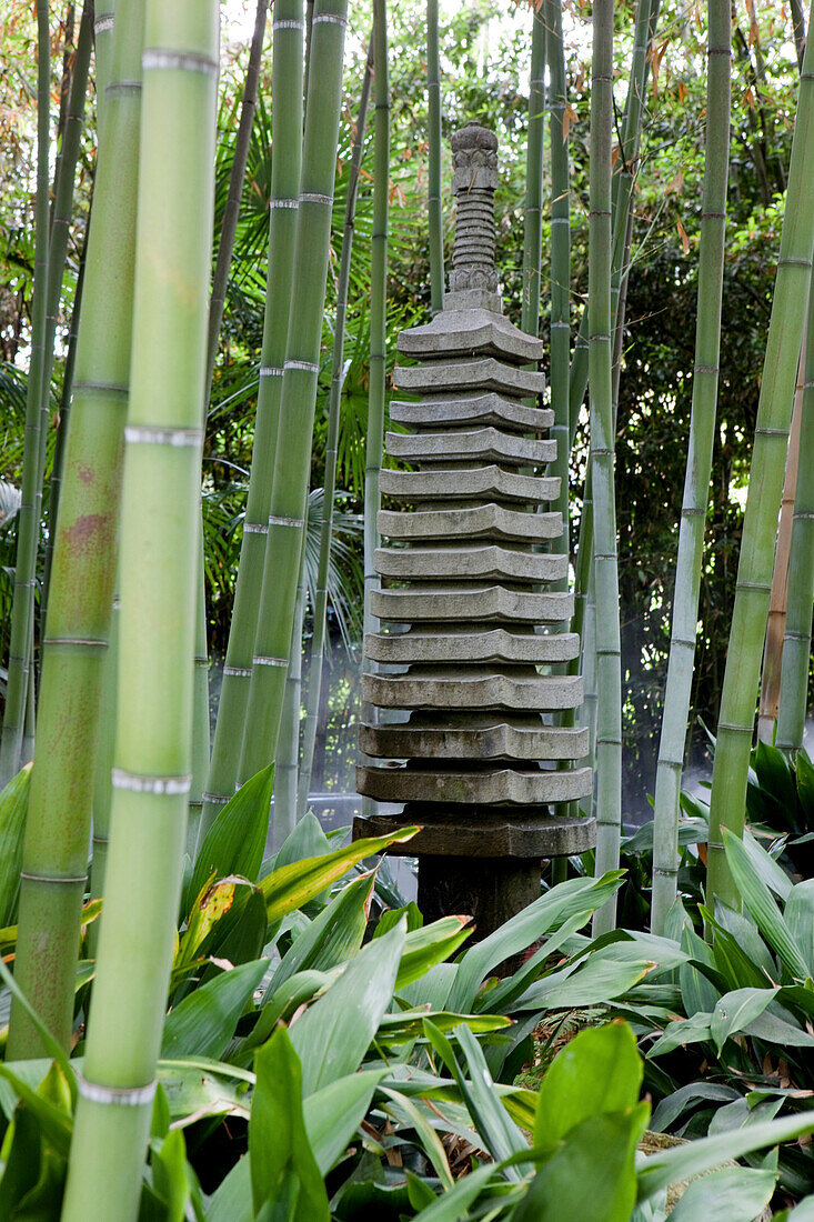 Asian sculpture in bamboo forest at Andre Hellers' Garden, Giardino Botanico, Gardone Riviera, Lake Garda, Lombardy, Italy, Europe
