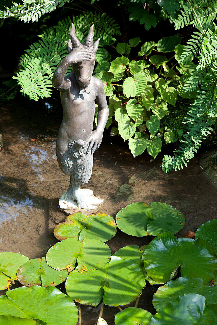 Pan Skulptur von Rudolf Hirt im Garten von Andre Heller, Giardino Botanico, Gardone Riviera, Gardasee, Lombardei, Italien, Europa
