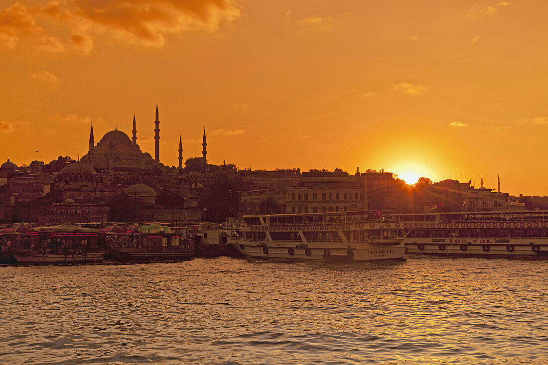 View over Golden Horn onto the Suleymaniye Mosque at sunset, Istanbul, Turkey