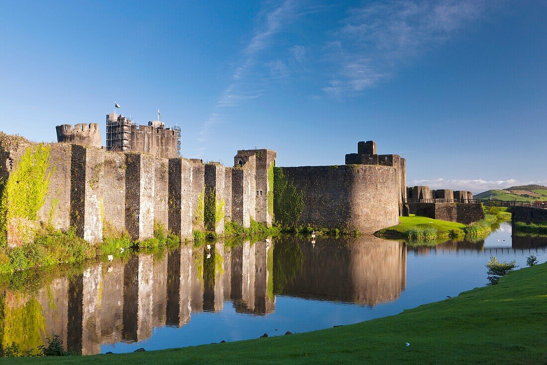 Caerphilly Castle Welsh: Castell Caerffili is a medieval castle that dominates the centre of the town of Caerphilly in south Wales  It is the largest castle in Wales and the second largest in Britain after Windsor Castle  Built mainly between 1268 and 127