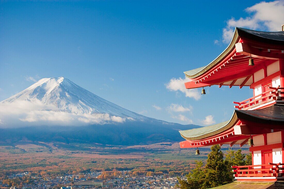 Pagoda overlooking Mount Fuji and Fujiyoshida city, Japan