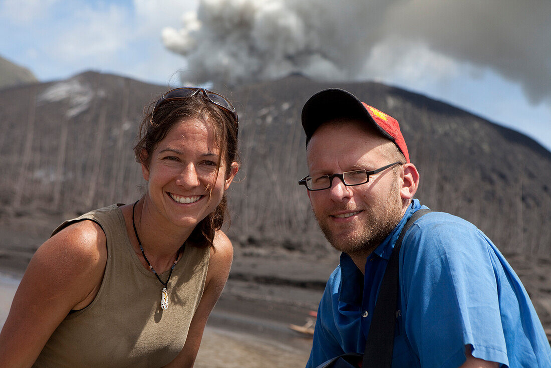 Roland Schulz, author for German GEO and Ulla Lohmann, photographer. Tavurvur Volcano, Rabaul, East New Britain, Papua New Guinea, Melanesia, Pacific
