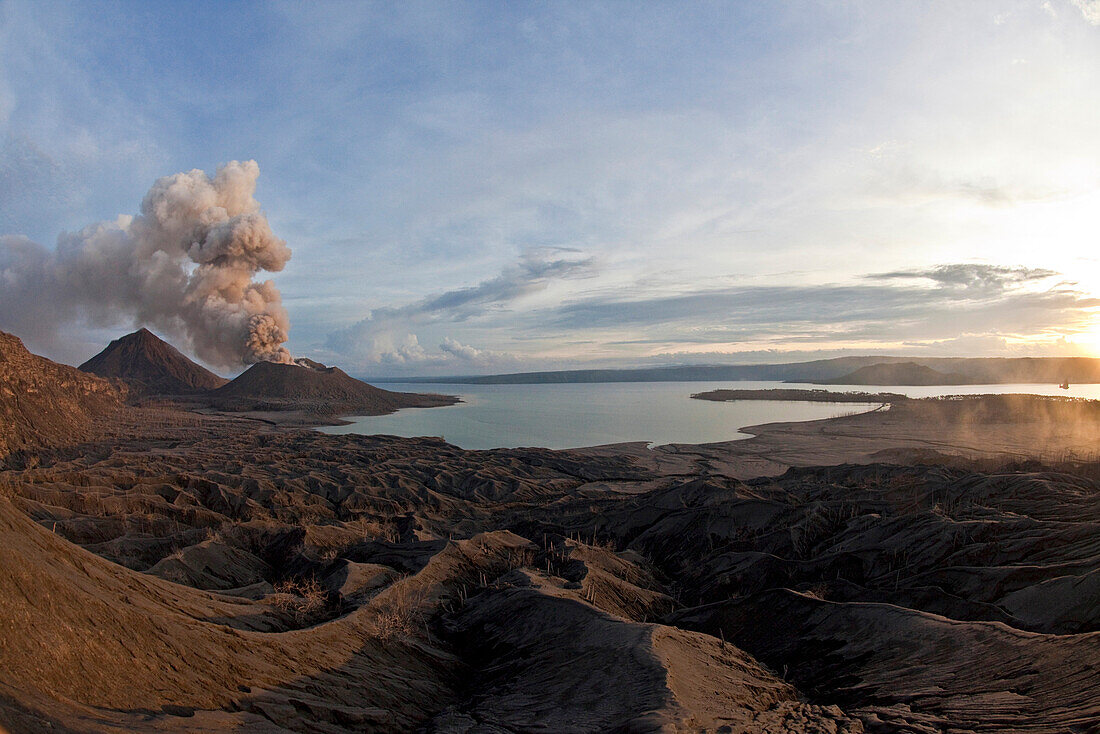 Tavurvur Volcano on the left, Matupit Island on the right. Another volcano in the background caused the destruction of the entire area in 1994, together with the Tavurvur Volcano, Rabaul, East New Britain, Papua New Guinea, Melanesia- Pacific