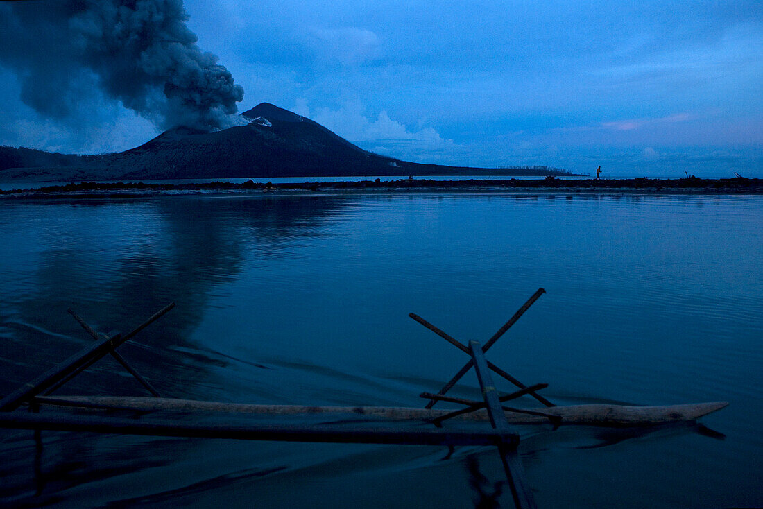 On the way to work. Egg hunters paddle across from Matupit to the volcano every day to dig for eggs. Tavurvur Volcano, Rabaul, East New Britain, Papua New Guinea, Pacific