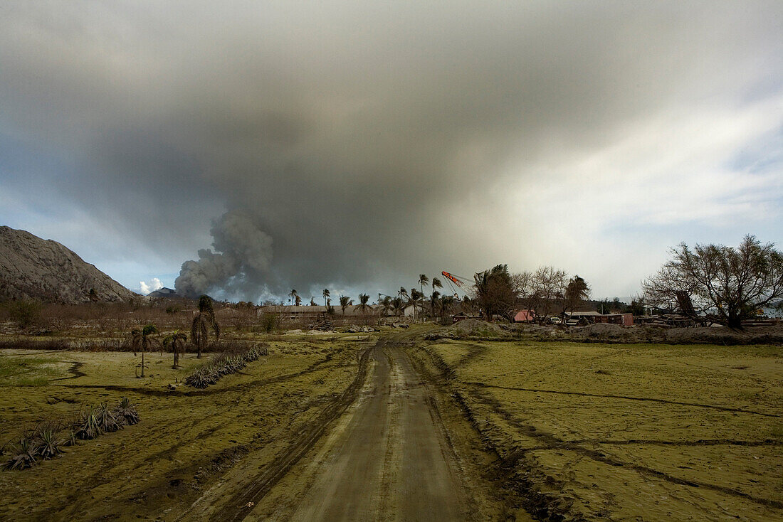 Rabaul city, there used to be 30000 people living here, and many called it the nicest town in the Pacific until the volcano eruption in 1994, which destroyed everything. Now, only 10000 people still live here amongst the ash, Tavurvur Volcano, Rabaul, Eas