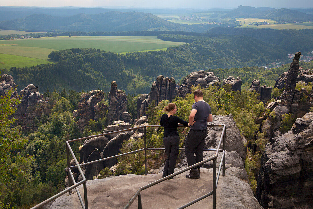 Hikers at the viewpoint from Schrammsteine Rocks, National Park Saxon Switzerland, Elbe Sandstone Mountains, Saxony, Germany, Europe