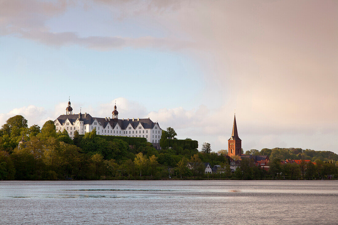 View over lake Grosser Ploener See onto the castle and the Nikolai church, Ploen, nature park Holsteinische Schweiz, Baltic Sea, Schleswig-Holstein, Germany, Europe