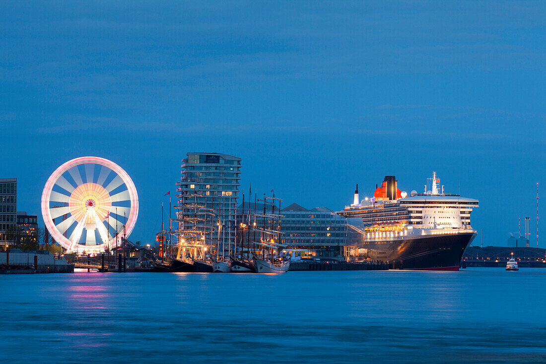 Cruise ship Queen Mary 2 at harbour at night, Hamburg Cruise Center Hafen City, Hamburg, Germany, Europe