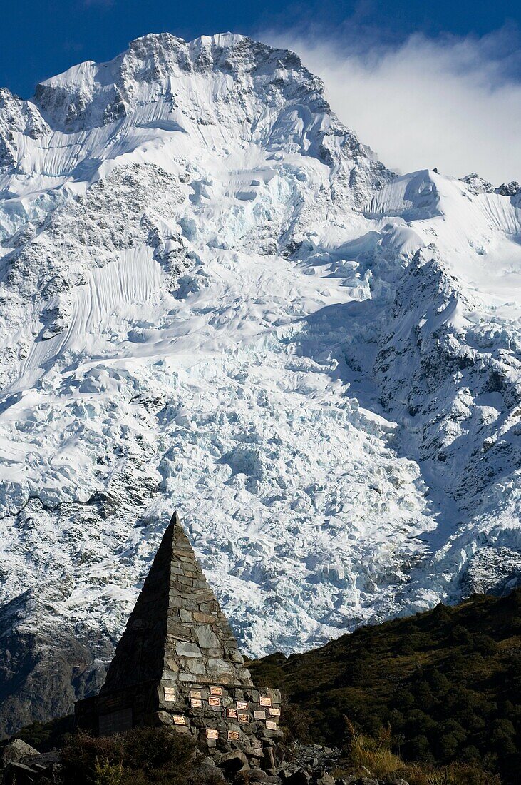 Memorial stone with Mt. Sefton in background, Mount Cook national park, New Zealand