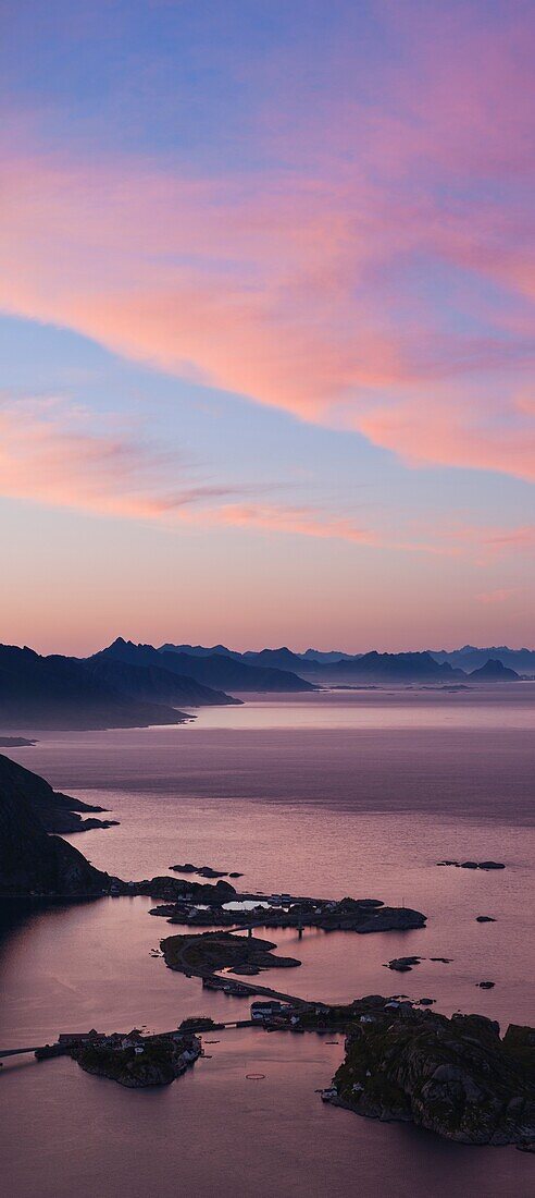 Sunset view from summit of Reinebringen peak over Reine and Lofoten islands, Norway