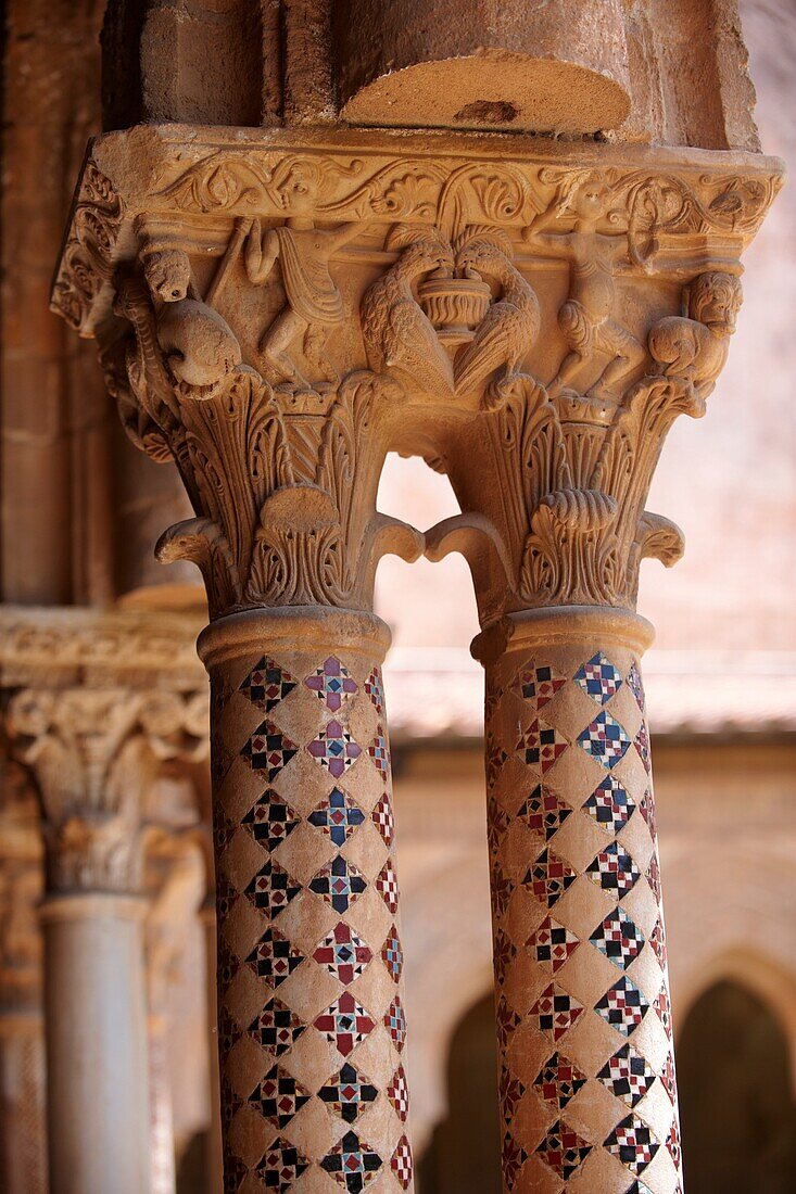 Decorated medieval historicated column capitals in the clositers of Monreale Cathedral - Palermo - Sicily