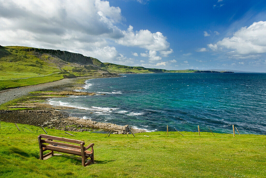 View over the coastline of the island of Skye, on the west coast of Scotland. A bench and viewing point on the cliffs., North Coast of Isle of Skye in Scotland