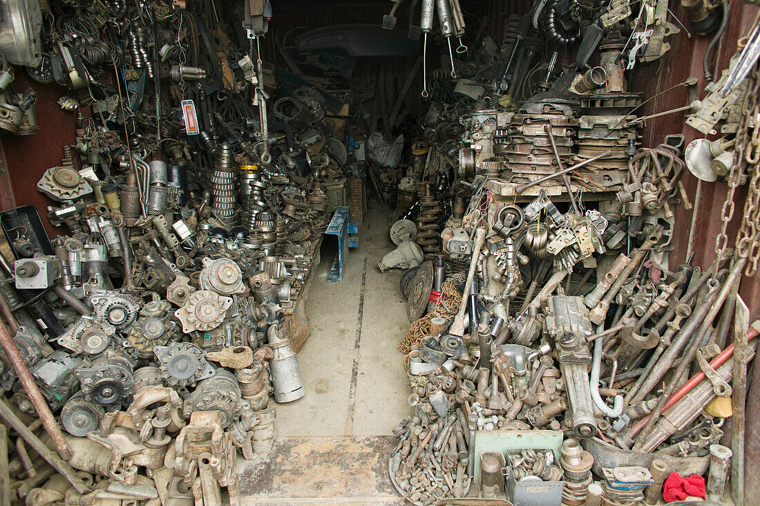 An Auto Parts store. A small workshop full of spare car parts, repair shop., Kabul, Afghanistan