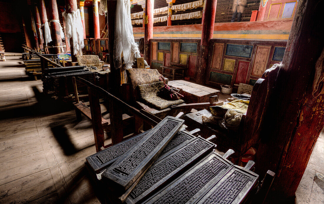 Derge Parkhang Printing House built in 1729. Equipment and printed matter. Religious texts. Hot metal set pages. Library. Wooden printing blocks. Historic press., Sichuan Tibet