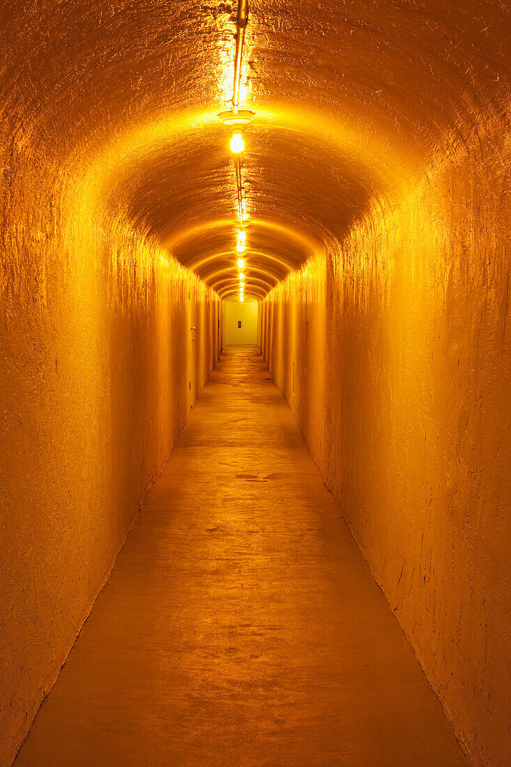 Long Corridor in a building in Death Valley, California. A narrow space with lights. Diminishing perspective., Long Corridor