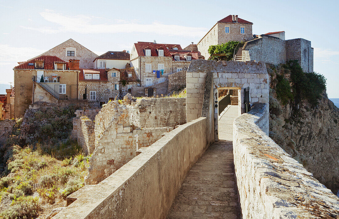 A walkway on the old city walls of the port of Dubrovnik, a UNESCO worlld heritage site and Adriatic coastal port., Dubrovnik city walls, Croatia