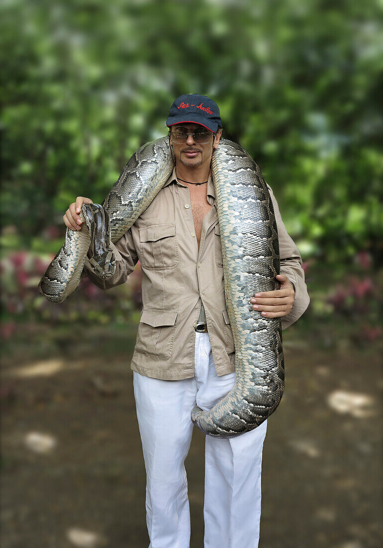 Tourist with Python, Davao, Mindanao, Philippines, Asia