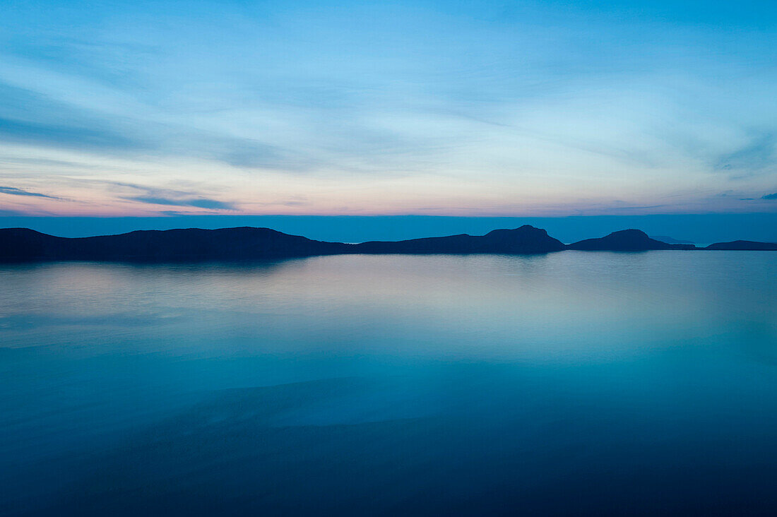 View of Sfaktiria island at dusk, Ionian sea, Peloponnese, Greece, Europe