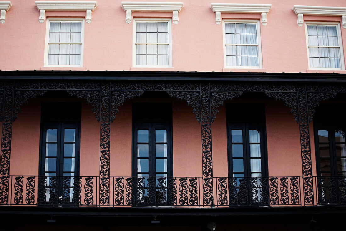 Pink Building With Row of Windows and Wrought Iron Balcony, Charleston, South Carolina, USA