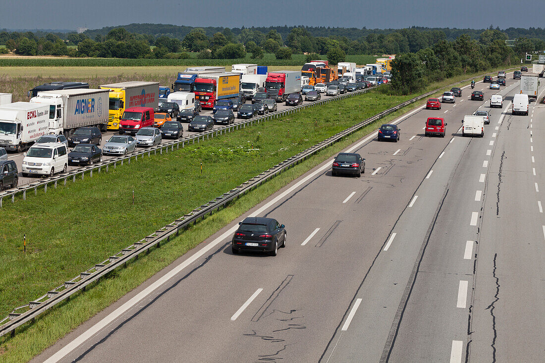 Traffic at a standstill on a German Autobahn, traffic jam, oncoming traffic is flowing, Bavaria, Germany