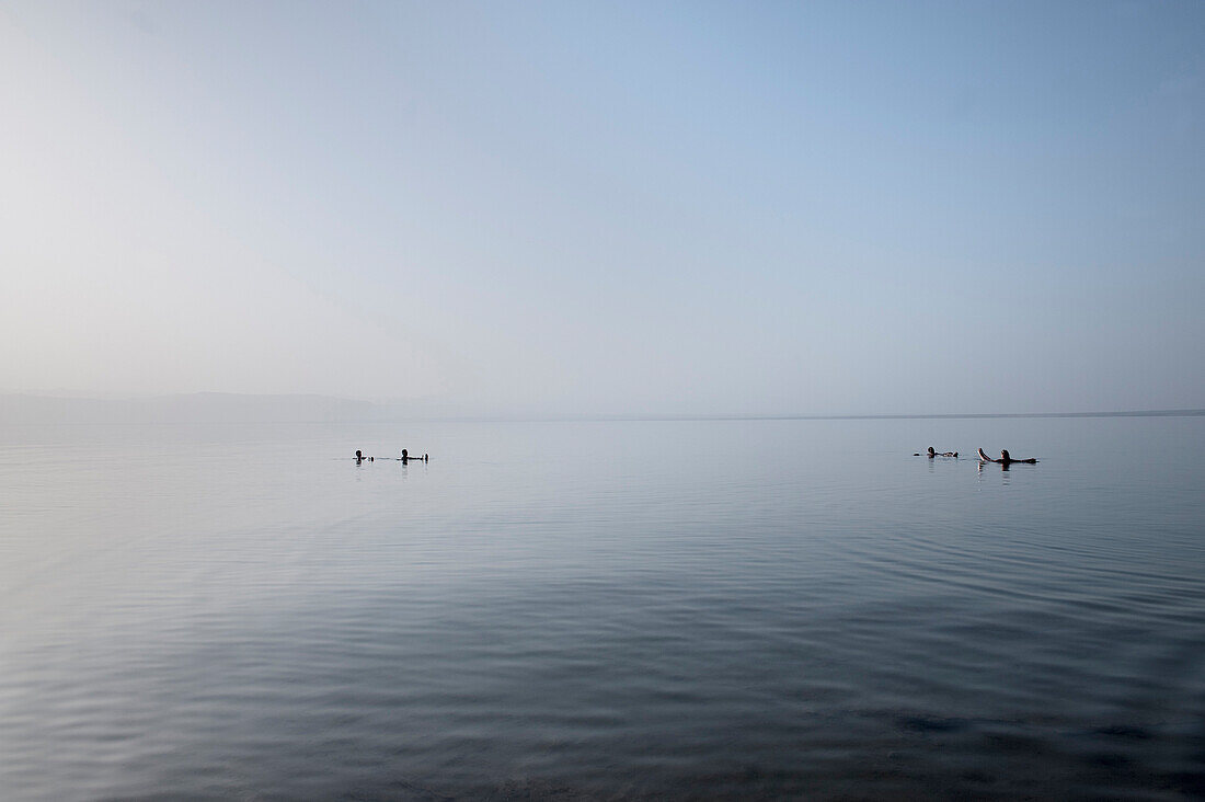 People floating in the Dead Sea, Dead Sea Panorama resort, Jordan, Middle East, Asia